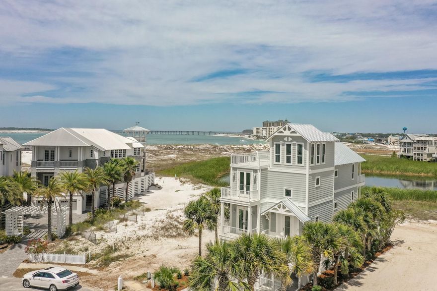 This home has been completely renovated. Almost everything inside and outside is brand new to include all new AC, electrical fixtures and plumbing fixtures, new roof, flooring and an improved floor plan with 4th bedroom plus a bunk room. The views from this house are absolutely amazing and overlook the Gulf of Mexico, East Pass and Destin Harbor giving owners breathtaking sunsets.Destin Pointe is the only gated beach community to boast two separate beach experiences in one beautiful gulf front community.
