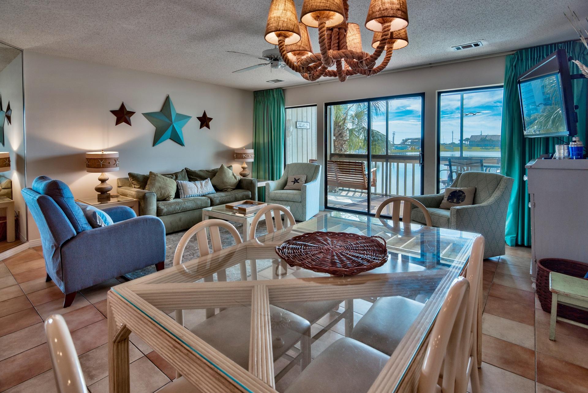 Rare opportunity to own a fantastic renovated condo within Seascape Boardwalk Villas - a prime location of Seascape Resort just steps away from the beach boardwalk. This unit is directly on Stewart Lake and also offers stunning views of the Gulf of Mexico. It is a two-level fully finished & decorated condo with 3-bedrooms, 3-bathrooms and not one but two screened-in balconies! This is the perfect second home, full time residence or vacation rental investment to enjoy the coastal lifestyle we all crave. With the new Seascape Resort Towne Center underway - commercial construction to be completed this year including Acme Oyster House, boutiques, dining & entertainment, an aerial entertainment ropes course and outdoor events plaza - everything is at your fingertips!