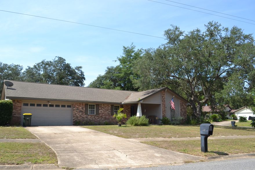 Perfect home in the perfect location! Located close to some fantastic schools and shopping.The high ceiling in the living room makes the room feel more spacious. Kitchen is open to the living room-perfect for entertaining guest without missing a beat.The wood burning fireplace will keep you warm in the winter.Private formal dining room with custom bookcase is great to keep everything organized and on display.Large pantry/laundry room located inside with plenty of room to store large items in the built-in cabinets, along with a folding station to help keep your laundry in check. *Washer and dryer do not convey. Large backyard with plenty of space for friends, neighbors or family. This home is located in a desirable neighborhood and is waiting for you to call it home!