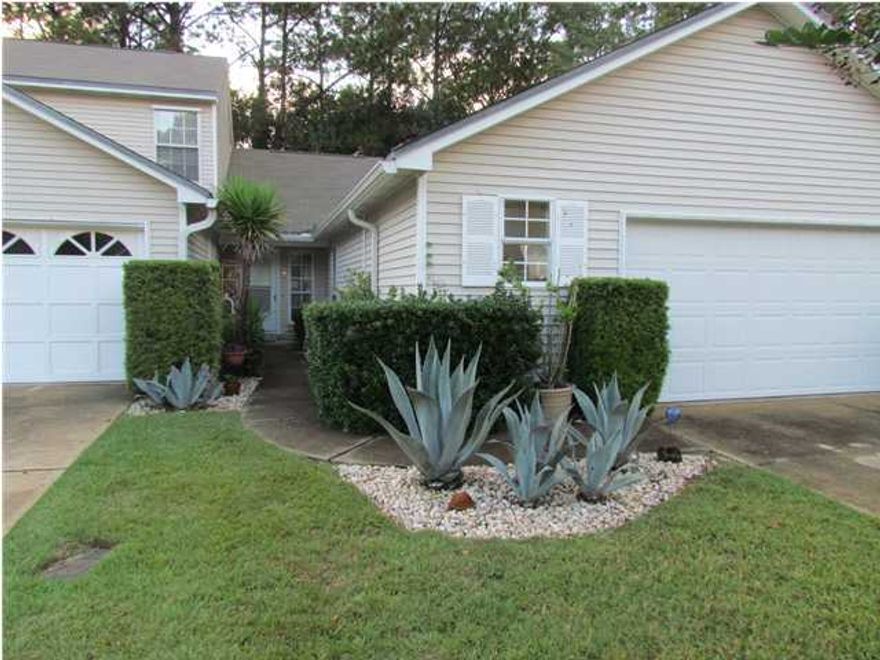 Very roomy town home. Two master suites and two living areas (den could be used as a third bedroom or office with beautiful glass french doors and it's own closet). Unit has numerous upgrades throughout including newer roof, newer appliances & newer tile flooring. Living room features a wood burning fireplace and cathedral ceilings. There's an oversized 2 car garage with an automatic garage door opener. The front yard is cared for by the association. You will love living in this quiet and convenient neighborhood, tucked between both bases. This unit is located across the street from the association pool. Owner will consider dog 35# and under. Dog must be spayed or neutered & fully housebroken. $255 non refundable pet fee required. Sorry no cats. Unit available 10/7/13