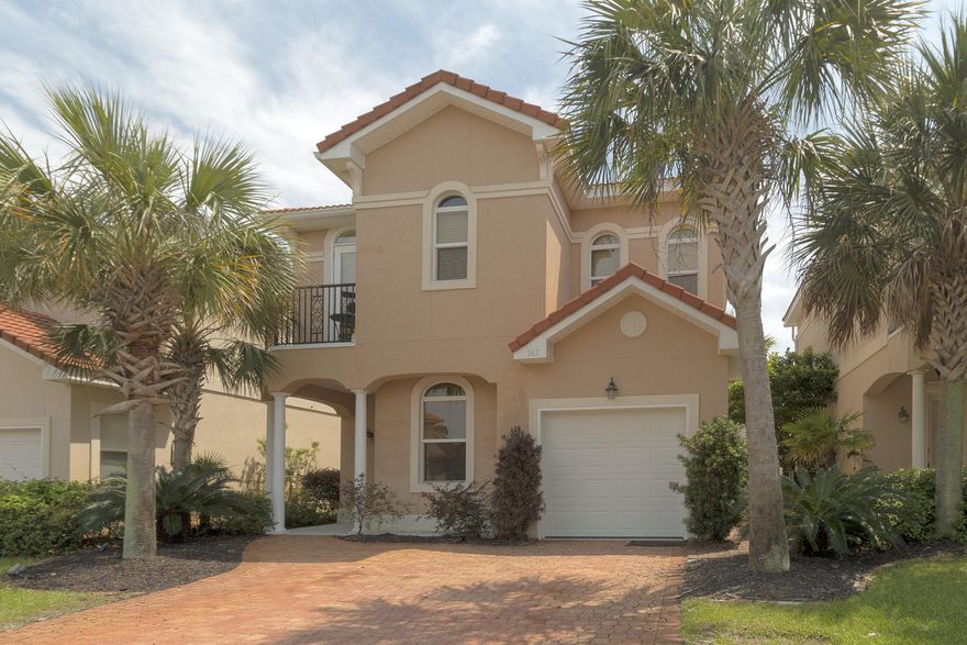 Gorgeous 3BR/2.5BA, Mediterranean-style home located in the gate community of Calusa Bay. This home features 10' high Spanish lace ceilings, crown molding, & tile floors throughout the 1st floor. The kitchen has GE Profile appliances, granite countertops, & a breakfast bar w/ eat-in dining area. The living room features surround sound & access to the covered back porch. Upstairs features the master suite, 2 additional bedrooms, & hallway full bath. The master suite has a large private balcony, double vanity, walk-in closet, & over-sized shower. Other features include security system, high impact 150 mph windows, built-in wine refrigerator, one car garage, & an office that could be used as a 4th bedroom. Too many features to name, this is a must see.