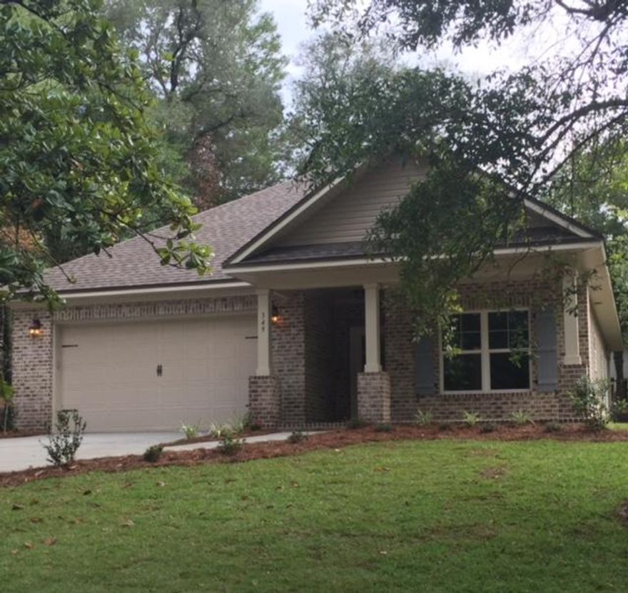 Builder will pay $5,000 toward closing with the use of preferred lender and title company. If you looking for a brand new home on a large lot, then this is the home site for you. 1,697 sqft, 3Bd/2Ba/2Ga, with an open floor plan. 3 cm solid granite counter tops throughout as well as raised vanities in bathrooms. You will love the detail and quality of finish throughout the home. Tile in wet areas. Laminate flooring in foyer, kitchen, living room, dining area, bedroom hall, and master bedroom hall. Carpet in bedrooms. Energy efficient Low-E, double pane windows throughout. Ceiling fans in family room and master bedroom. Sprinkler system with automatic timer and fully sodded lawn with landscaping package. Extended driveway with potential boat parking.