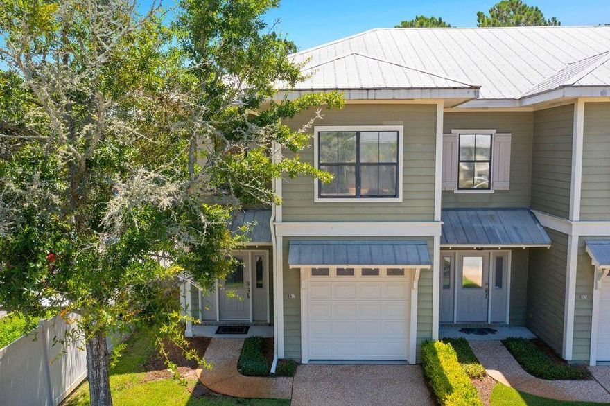 Want to be on the South Side of 98 but not have the high payments? Don't let this Beautiful, Freshly Painted 3 bedroom, 2.5 bath Townhome pass you by. The Granite Counters, SS Appliances, Covered Patio, 1 Car Garage, 3 Large Bedrooms, Laundry on the 2nd floor makes this home a must have! After a day of shopping, a day at the beach, hiking, bike riding or dining, come home and relax at the community pool! With this home checking all the boxes: Primary Home, Vacation Home, Long Term Investment rental, it is a must have! Make your appointment today for a viewing.