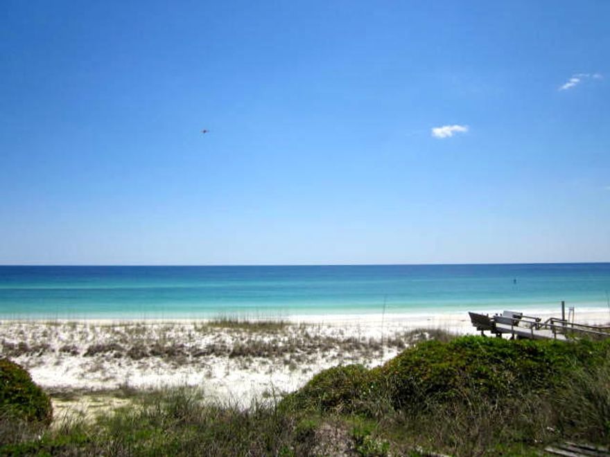 Gorgeous Views!!! One of the last WIDE lots available - 96 feet of Gulf Frontage. One large single family home, duplex or up to a four unit town home complex can be built on this lot.