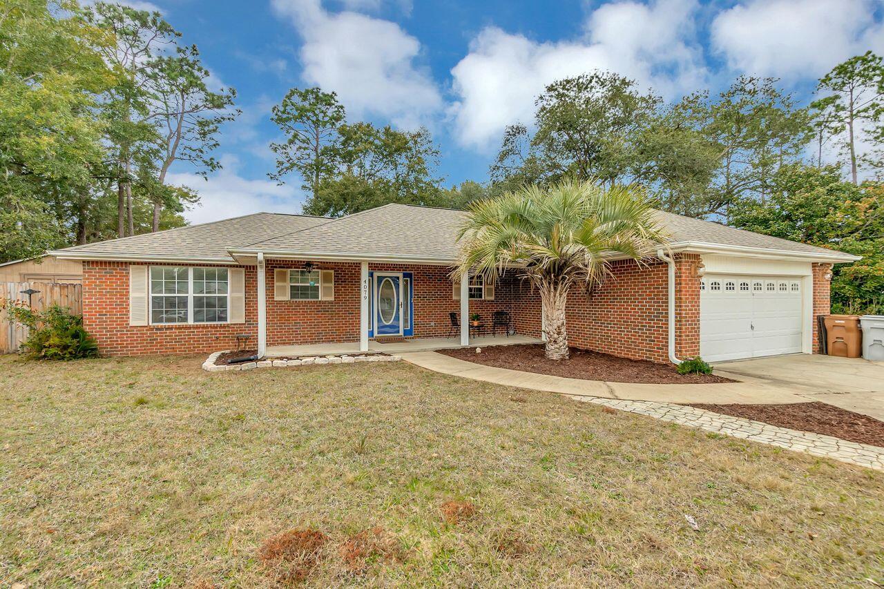 Seller is offering $8400 in buyers closings costs with full price offer only. Nestled in at the back of the neighborhood on a quiet cul-de-sac is this terrific home! With a brand new roof in 2020, covered patio, fire pit, and terrific 12x16 yard building, this is perfect place to raise a family and enjoy the outdoor lifestyle. As you enter the home, you're welcomed by beautiful engineered hardwood floors in the great room, dining area, and additional bedrooms. The great room features a lovely updated wood-burning fireplace as its focal point. The split floor plan offers privacy for the master suite which features a trey ceiling, walk-in closet, and ensuite bath with two separate vanities, garden tub, and separate shower.
