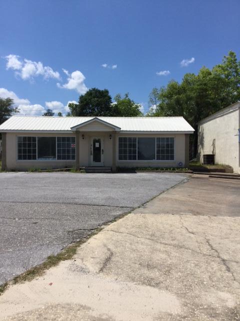 Bank-owned commercial opportunity on Hwy. 90 West in Defuniak Springs, just 1/2 mile from Hwy. 331. Commercial building with approximately 1,711 SF and additional 374 SF of storage accessed by roll-up door in rear of building. High visibility on heavily traveled Highway 90. Ideal for office or retail.