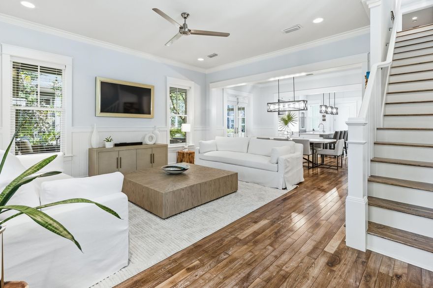 Nestled on the corner of E. Royal Fern and Sunflower in the heart of WaterColor, this beautifully maintained 3-bedroom, 3.5-bath residence with a one-car garage and inviting outdoor living spaces is offered mostly furnished. Proudly owned by a single family since its completion, this home has been meticulously cared for and thoughtfully updated throughout. The chef's kitchen is a true centerpiece, featuring brand-new custom cabinetry, top-of-the-line Thermador appliances, quartz countertops, newly added open shelving, and a generous walk-in pantry. The open-concept layout flows seamlessly into the main living and dining areas, creating an ideal setting for both everyday living and effortless entertaining. Upstairs is the primary suite with a private porch nestled among the treetops... ... the perfect place to unwind. The second level also includes two spacious guest bedrooms with ensuite full bathrooms and a second living area space comfortably accommodating family and friends. Recent updates and upgrades include distressed oak flooring, quartz countertops throughout, all full baths beautifully updated, a stylish bar area with dual wine refrigerators, an expansive wraparound screened porch, an outdoor summer kitchen, and a stacked brick gas firepit  perfect for enjoying WaterColor's peaceful evenings and finally 2 new AC systems.. 
Set within 499 acres of scenic beauty, WaterColor captures the essence of coastal living with its charming architecture, lush landscapes, and unparalleled amenities. This celebrated community, tucked between the Gulf of Mexico and Western Lake  a rare 220-acre coastal dune lake  offers something for everyone. Residents enjoy access to the homeowner-owned Gulf-front Beach Club, the largest on 30A, boasting three resort-style pools, a full-service restaurant, and easy beach-to-pool access. Camp WaterColor offers a lazy river, water slides, additional pools, park areas, and dining options. The community also features miles of walking and biking trails, a boathouse for kayaking and paddleboarding, a world-class tennis facility, and close proximity to Seaside's charming shops and restaurants. Recognized for excellence, WaterColor Resort has earned Forbes' Four-Star designation every year since 2013 and has been named the #1 resort in Northwest Florida by Cond?? Nast Traveler readers. This home embodies the perfect blend of modern comfort, timeless style, and the relaxed luxury that defines the WaterColor lifestyle.
