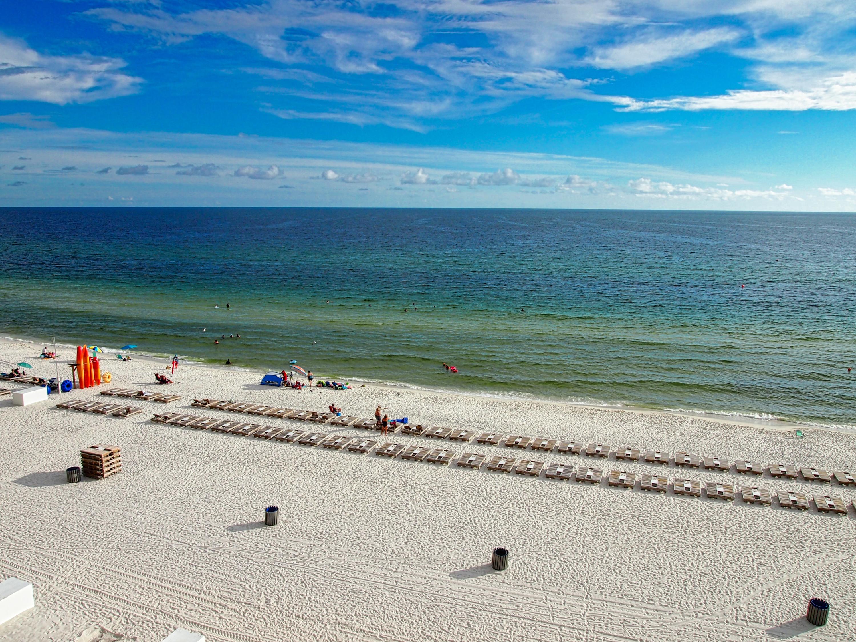 Tidewater 402 is a fabulous low-floor, spacious, three bedroom, three bath, owner-managed, Tidewater Beach Resort rental condo! Looking for a low-floor condo that can easily be accessed? Look no more! Tidewater Unit 402 is only two flights of stairs from the garage skywalk entrance. No need to wait on elevators as you come and go. It gets better still! The association allows for up to three garage-parked vehicles with this condo! The low-floor views showcase the gulf-front, quartz-white sand, emerald gulf waters, beach activities, etc. Pier Park is within walking distance and views of the pier are included from the balcony! Three large bedrooms, and spacious living, dining, and kitchen areas provide all the room you will need. Two king beds and two queen beds accommodate eight guests.