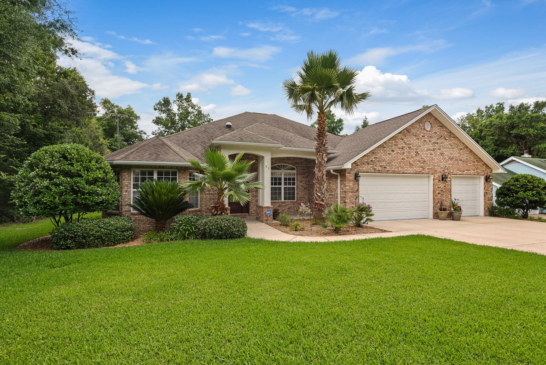 JUST 7 MINUTES TO BLUEWATER BAY! Nestled between the Choctawhatchee Bay and Eglin Reservation land, in an area known as Choctaw Beach, lies the picturesque little community of Lake Sharon Estates. Here, dreams really DO come true. This gorgeous custom home has everything your heart desires just outside of ''the big city''. Spend your days lounging by your screened in pool and spa or stroll down to the lake to cast in your line. Come home to a steamy shower in the master walk in complete with ceiling mounted rain shower head then cook up your catch in your gourmet kitchen. Have other hobbies in mind? Your third garage is fully finished including heat and air and doubles as a workshop or studio. All the bells and whistles. Call today for an exclusive showing appointment.