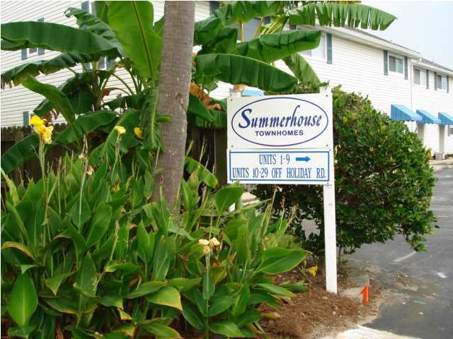 Summerhouse Townhomes don't become available often....especially the ones on the south side of the complex! Could be a great short term or long term rental!! Just steps away from the beach, this ''end unit'' could be your perfect primary residence, second home, vacation getaway or investment property. On the first level is the kitchen, open living/dining area with crown molding, half bath with new vanity and large under stairs storage. The second level has the master suite, with large closet and new bathroom vanity and a balcony offering a peek of the Gulf. A large second bedroom and full bath with new vanity are also on this level. This unit overlooks the pool and common green area. Two assigned parking spaces directly in front of the unit. Amenities include pool, clubhouse with