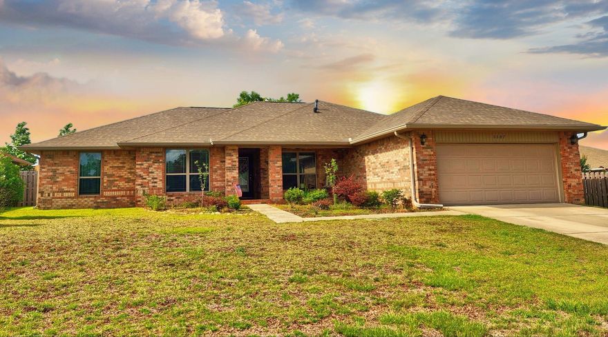 A stunning all-brick 4-bed, 2-bath residence on over a 1/4 acre. This meticulously crafted home offers an unparalleled living experience. Adorned with architectural shingles and a robust raised panel steel garage door. Inside, discover a beautifully finished home, ceiling fans in the master and living areas. The knockdown ceilings, and bull-nosed corners exude elegance. Brushed satin hardware and lights. The master bathroom boasts a separate shower.Encounter true Florida living under the 14 x 16 covered rear porch.Breakfast nook & Formal Dining RoomSurvey AvailableROOF / HVAC / WH ALL 2017Includes removable shutters Buyer to verify all dates, measurements, HOA info & anything deemed important.