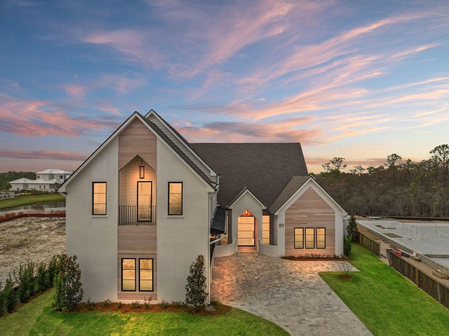 Welcome to your custom dream home in the exclusive Watersound Camp Creek community. This beautifully designed 5-bedroom, 4.5 bath residence located at 89 Quail Hollow Court offers the perfect blend of luxury, functionality, and coastal charm boasting 4386 sq ft. of living space.  Step into an open-concept floor plan featuring 16-foot ceilings in the family room/kitchen and 12 ft. ceilings throughout.  The home will have expansive wood floors, and large windows that flood the home with natural light. The chef's kitchen is a culinary masterpiece, outfitted with high-end appliances, custom cabinetry, and an adjoining scullery--ideal for entertaining and effortless meal prep. The thoughtfully designed layout includes three spacious bedrooms on the 1st level, including the luxurious primary suite with spa-inspired ensuite bath and an oversized closet. On the 2nd level, you'll find two additional bedrooms, a versatile media, living space, and a convenient kitchenette perfect for guests or multi-generational living. 

Every inch of this home showcases top-of-the-line designer finishes and craftsmanship.  The location within the community offers close proximity to the amenities with ultimate privacy having a forest in the rear which will never be developed.   The home is currently under construction with an estimated completion date of Feb. 2026.  The builder welcomes input from the buyer on customization of final finishes.  

Owners in Watersound Camp Creek enjoy an exclusive level of membership to The St. Joe Company's Watersound Club. This entitles you to direct access to the club amenities at Camp Creek including resort pools, an 11,000 square foot fitness center, tennis and pickleball courts, multiple private dining venues, and Tom Fazio designed golf course. Other member benefits include the Watersound Beach Club amenity center with complimentary gulf-front chair and umbrella service. Members also enjoy golf at the private Shark's Tooth course at Wild Heron and The Third, the club's newest course. 
