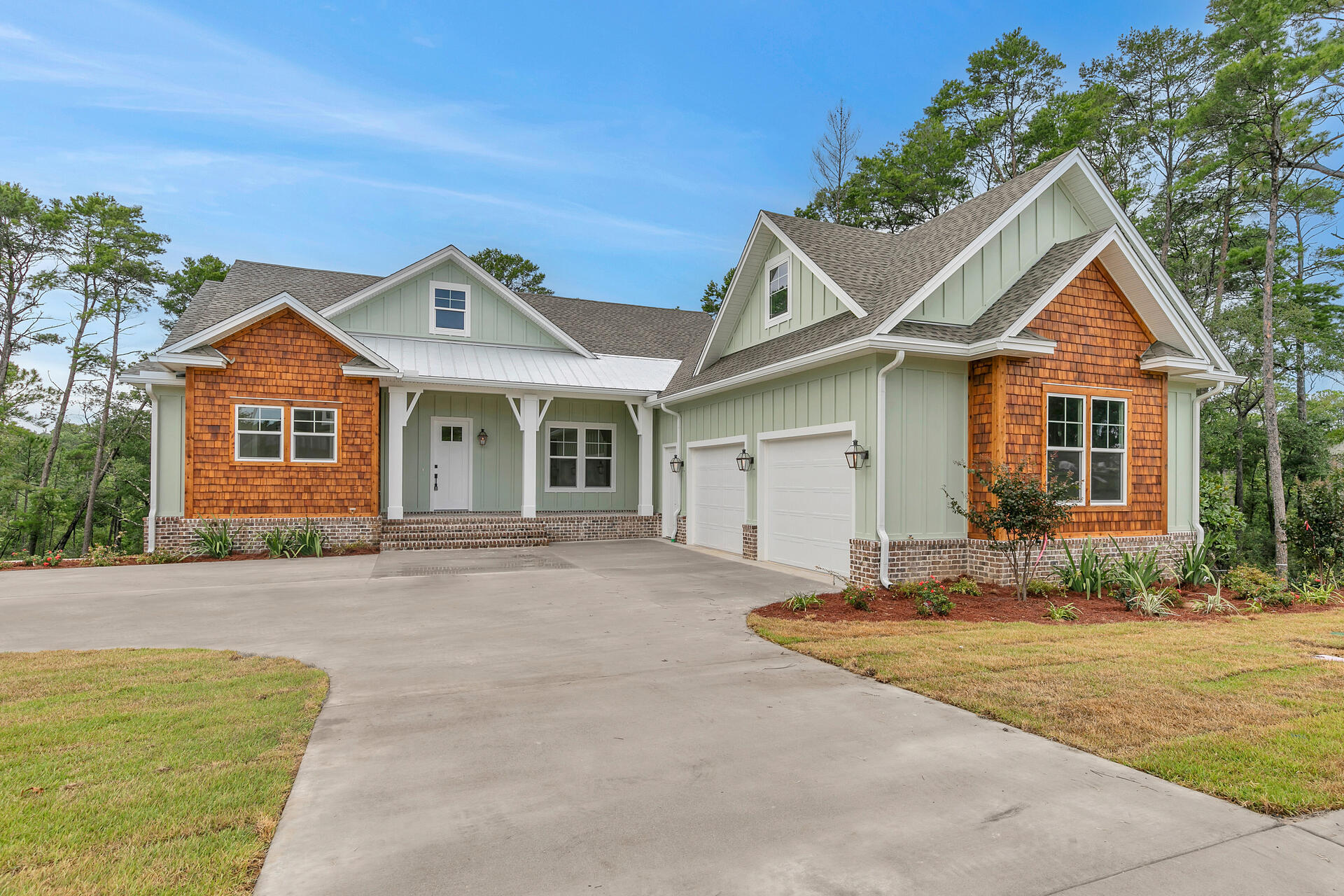 Back on the market at no fault to sellers! This exquisite new home nestled on a prime lot in Deer Moss Creek features 3167 sq ft with 4 bedrooms, 4 baths, a storm room, plus a rec room! The exterior will boast stunning cedar shake and metal accents, gas copper lanterns, and cypress porch columns. The gorgeous front porch with wood ceiling welcomes you to a spacious foyer. The open floor plan leads you to a large family room that features a stunning fireplace and a breathtaking view of your natural landscape. The beautiful kitchen is tailored for hosting, with quartz countertops and stainless steel appliances. The spacious master bedroom and one bedroom/study are conveniently situated on the first floor. The fabulous back porch awaits you for your morning coffee or your glass of wine.
