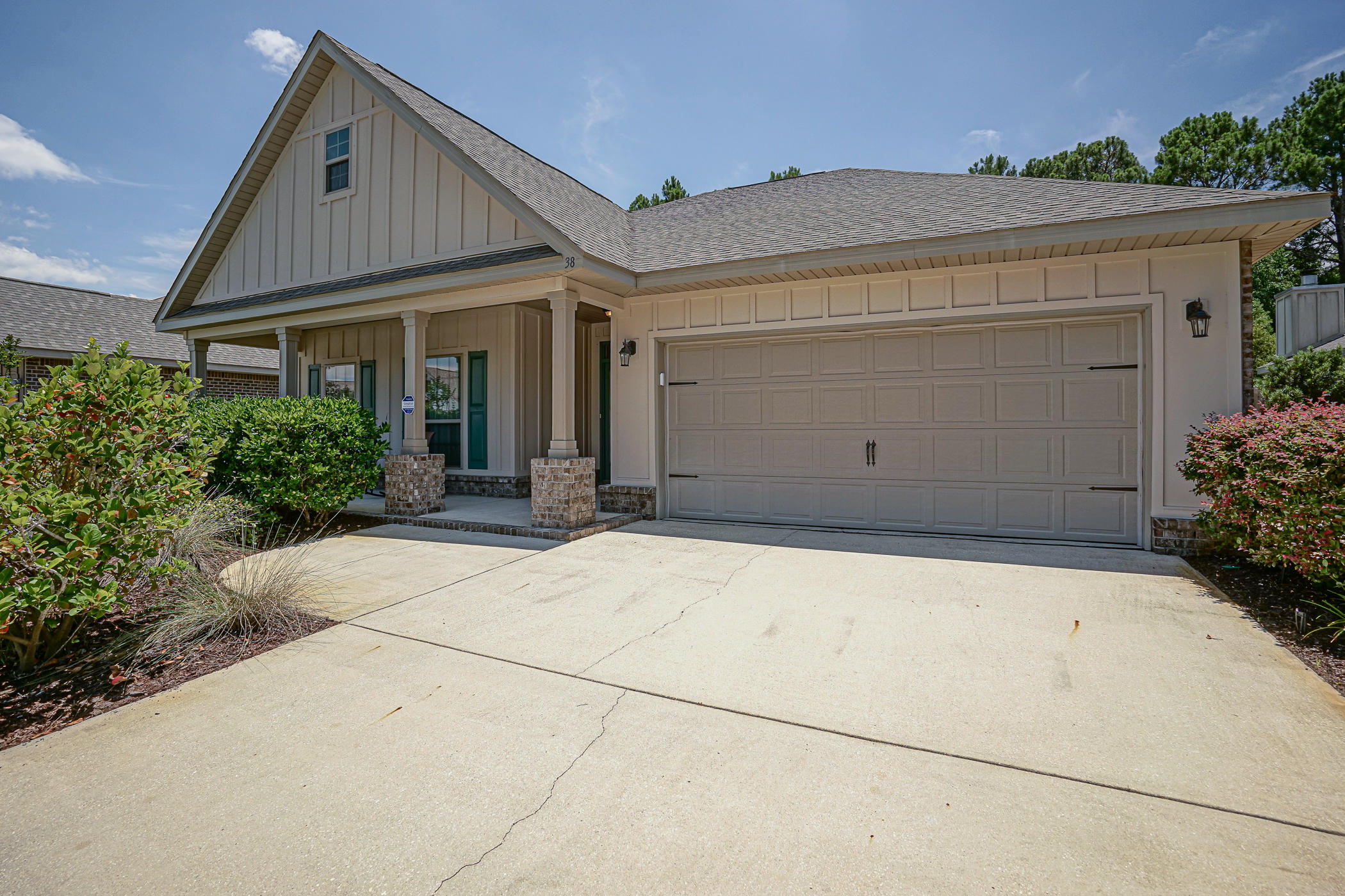 You found it! This one owner, meticulously maintained, 3 Bedroom, 2 Bath home has never been rented and used primarily as a second home. As soon as you walk through the door, you are greeted by an oversized foyer leading to the openly designed living, kitchen, and dining area. The flooring features a beautiful engineered hardwood, with tile in the kitchen and dining room. This home also features granite countertops in the kitchen and both bathrooms. Escape to a huge master bedroom that boasts a sitting area, looking into the back yard. This zen like space features lush landscaping and a quaint bridge that leads to an extra gathering spot, perfect for a fire pit. This home truly is a must see! Call today for your private showing.