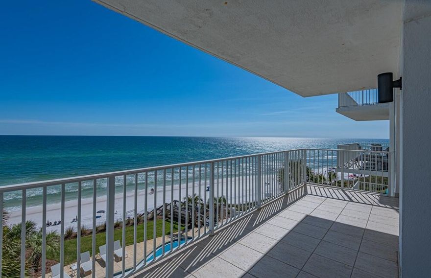 Perched atop the alluring heights of a 45 ft bluff along the scenic 30A, White Cliffs Condominium in Blue Mountain Beach beckons with its unparalleled views of the Gulf of Mexico. Introducing Unit 401, a coastal haven that marries the tranquil essence of the beach with a modern remodel that's sure to enchant.With three generously appointed bedrooms and three full baths, this exquisite space extends an exclusive invitation to luxury beachside living. The addition of a half bath--flaunting a mid-century modern flair--serves as a chic contrast to the Coastal Modern style that sweeps through the rest of this unit.Epicurean delights await in a state-of-the-art kitchen featuring a Wolf Induction Range Oven and an expansive 42'' Decor Refrigerator. Entertain with ease as guests mingle around the under-counter beverage center, marveling at the dolomite marble mosaic tile that dances above the stove. The beige Napa narrow shaker-style cabinets, adorned with maple dovetail drawers and soft-close technology, echo the thoughtful elegance found throughout.
Savor the blend of form and function with top-of-the-line Bosch appliances, including a whisper-quiet dishwasher and a pristine porcelain farmhouse sink. The Taj Mahal Quartzite countertops in the kitchen and guest bathroom are rivaled only by the pristine white marble that graces the master batha testament to the uncompromising quality that defines this most recent renovation completed in March 2024.
The master suite is a sanctuary of serenity, boasting an open layout with a solid-surface soaking freestanding tub that promises to dissolve your worries in its luxurious embrace. Ensuring your comfort, a brand new water heater accompanies the well-maintained HVAC system, which is only four years old.
As one of the few non-rental units along the coveted stretch of Highway 30A, Unit 401 at White Cliffs is a rare jewel, offering both privacy and prestige. Imagine the breathtaking sunsets that end each day with a symphony of colors, seen from the best vantage point in the complex. Here, every day is a chance to live the beach dream, wrapped in the luxury of modern living and the timeless beauty of the Gulf shores. 


