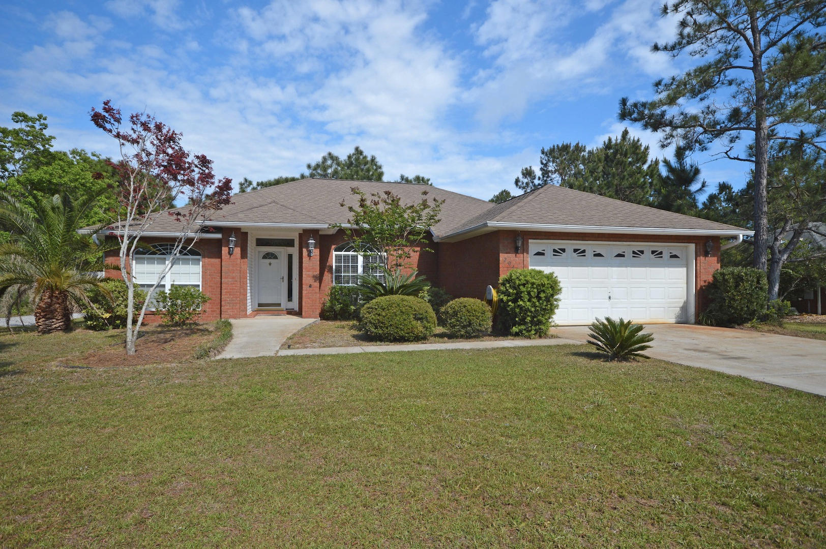 Immaculate custom-built Mike Stanley home. 1662 sq. ft. 3 bdrm, 2 bath, all brick property. Home is upgraded throughout. Features include: bull nose corners, corner fireplace, split bedroom plan, some bamboo flooring, tile in the bathrooms, foyer, and in a kitchen for the gourmet. Glass doors, all plywood, pots and pan drawers. Sellers have also added the privacy fence fully enclosing the large back yard. This home comes with custom hurricane shutters that easily install at a moments notice. Price all these upgrades, and you will see that their loss is your gain!!! Come see the difference in a truly custom-built home. You won't be disappointed.