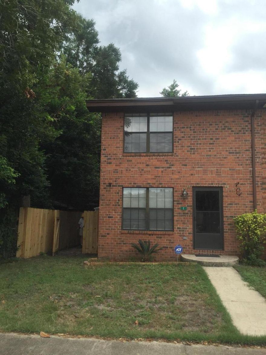 Very nice townhome in the downtown area of Fort Walton Beach. Recently updated kitchen with new cabinetry stainless steel appliances and tile floors. Large inside laundry room. Living room and den are tiled. There is a 1/2 bath downstairs. 2 bedrooms and a full bath upstairs with large closets. Fenced in back yard with built in fire pit, covered deck and storage building. Conveniently located to schools ,dining, shopping, military bases and the beaches.   *All Coastal Realty Services residents are enrolled in the Resident Benefits Package (RBP) which includes renters insurance, HVAC air filter delivery (for applicable properties) and our best-in-class resident rewards program, and much more! More details upon application.*