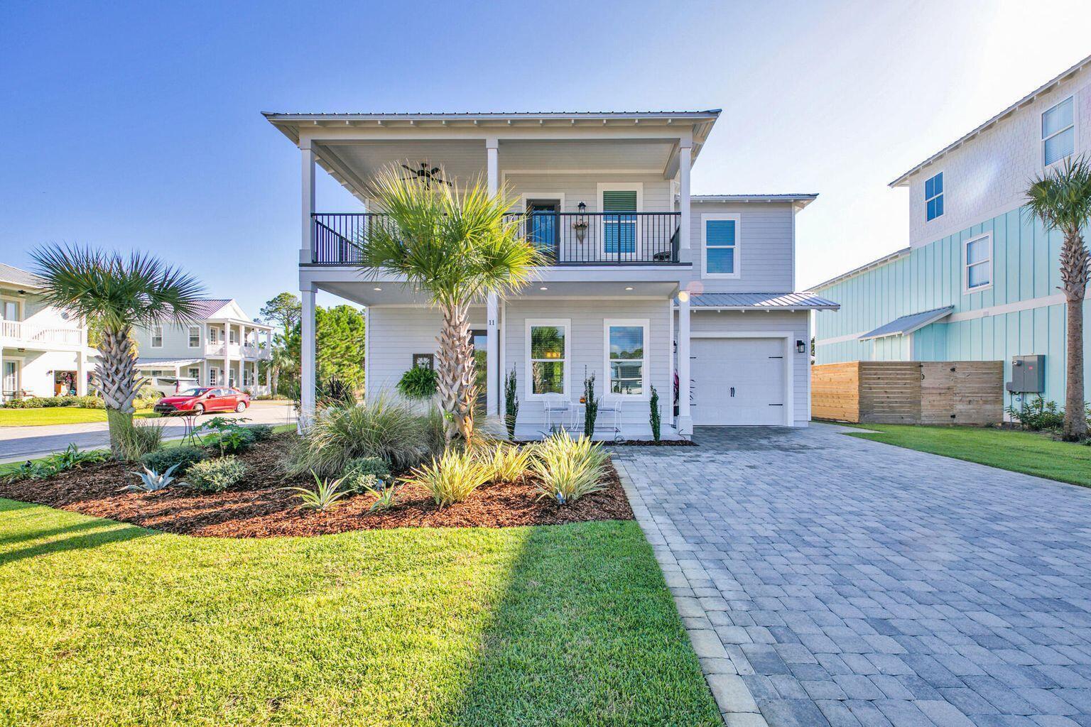 Situated within an exclusive gated community of Frangista Beach, this beach house ensures privacy and security. Its prime corner lot position provides additional space creating an inviting atmosphere for residents and guests alike. A short, leisurely stroll leads directly to the pristine sands and soothing waves of the nearby beach, making it ideal for beach enthusiasts.Spanning a generous floor plan, the house includes four well-appointed bedrooms and 3.5 bathrooms, accommodating family and guests comfortably. The open-concept living area seamlessly connects the living room, dining space, and a modern kitchen equipped with stainless steel appliances and ample counter space. High ceilings and tasteful finishes contribute to an airy and elegant ambiance. A covered patio provides the perfect setting for alfresco dining or relaxing while enjoying the coastal breeze. A two-car garage offers convenient storage for vehicles and beach equipment. Residents and guests might also enjoy access to the community swimming pool and exercise room. This one you'll want to see...
