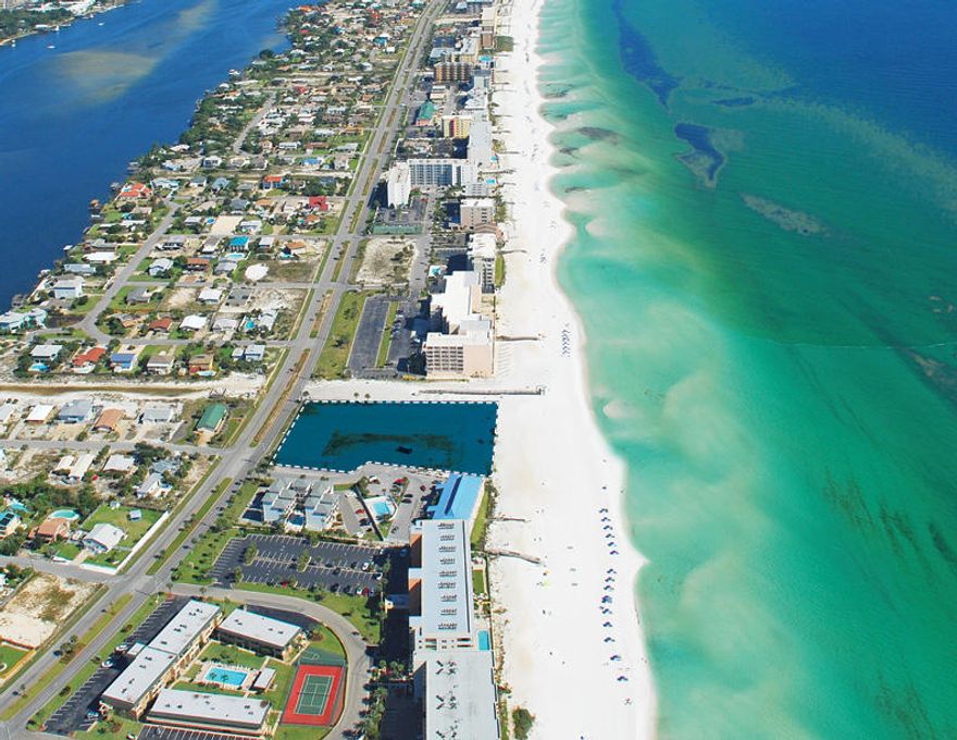 blu - Okaloosa Island's first pre-construction offering in nearly a decade. A premier Gulf-front condominium of Coastal Contemporary Design. Plan B is a spacious 1,837 sq ft, 3 bedroom 3 bath residence with a media room & 235 sq ft expansive gulf front terrace. Interior appointments include ceramic tile, gourmet kitchen, quartz countertops, gas ranges, stainless appliances, cabinetry, full size washer/dryer and owner closet. Property amenities include 2 gulf front pools, one heated, totaling over 4,500 sq ft and front 313' on the Gulf, fitness center, covered parking, jetted hot tub, grilling area, fire pit & gated entrance. Short term rentals & owner pets allowed. Limited availability at pre-construction prices. CONTRACT your residence TODAY