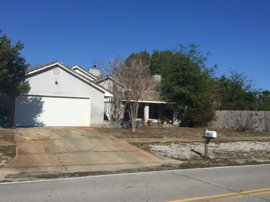Huge CORNER LOT in West Destin. Family home with a pool needs TLC. TONS OF POTENTIAL. More pictures coming soon!