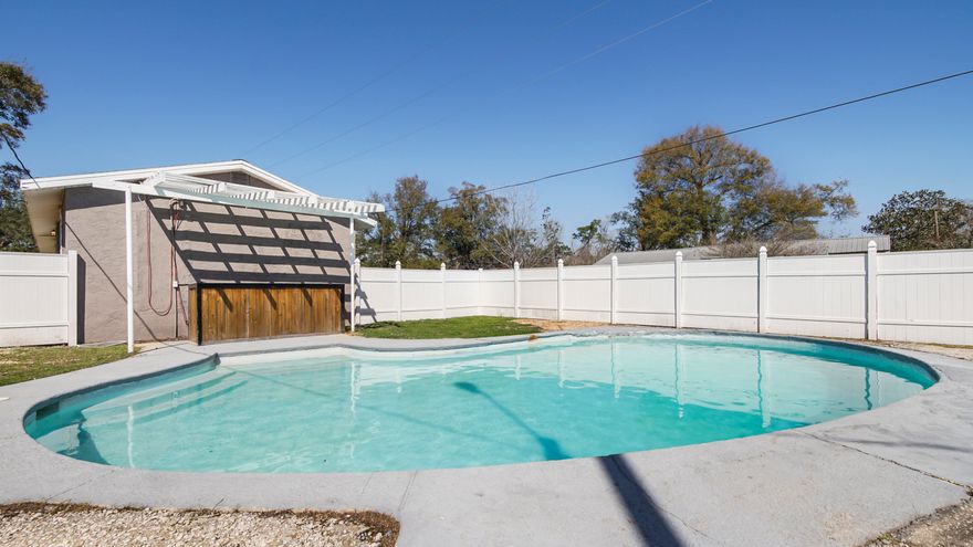 Welcome to this beautifully updated 3-bedroom, 2-bathroom pool home, located on a spacious corner lot in Southport. Renovated in 2022, this home offers modern living with a range of recent updates, including a new water heater (2024), well pump (2025), AC unit (2021), and roof (2019). Inside, you'll find an split floor plan with LVP flooring throughout, a remodeled kitchen with newer appliances, and a master suite featuring a walk-in closet. The home is bright and inviting, perfect for both everyday living and entertaining. The real showstopper is the backyard! Enjoy your own private oasis with a 30' pool, large pool deck, and a pergola ideal for gatherings. The backyard also provides ample space for storage, a shed, or additional parking. Conveniently located just minutes from Southport Elementary School and nearby boat launches, this home combines comfort, modern updates, and accessibility. Don't miss the chance to own this exceptional propertyschedule your showing today!