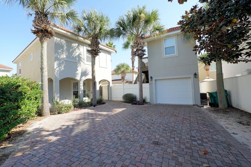 This distinctive property offers three bedrooms and two and a half baths in the main home, plus a separate guest suite situated above the one-car garage--perfect for visitors or a private office space.Enjoy outdoor living at its finest with a sparkling in-ground pool, brick-paved courtyard, covered pergola, and outdoor kitchen--ideal for both relaxing and entertaining.Inside, the kitchen features stainless steel appliances, granite countertops, and a central island overlooking a cozy gas fireplace. A charming exposed brick wall adds warmth and character to the space. Gorgeous hardwood floors flow throughout the main living areas and bedrooms, while travertine tile enhances the bathrooms.Located in the gated community of Calusa Bay, just one mile east of Destin Commons....  residents enjoy access to a community pool and scenic lakes at both ends of the neighborhood. A deeded walking and biking path connects to the neighboring Regatta Bay Golf Course community, offering a beautiful setting for outdoor recreation.

Pets may be allowed with Owner approval and a non refundable pet fee. NO smoking.
All applicants 18 years or older must fill out and application @ www.nicevillerentals.com