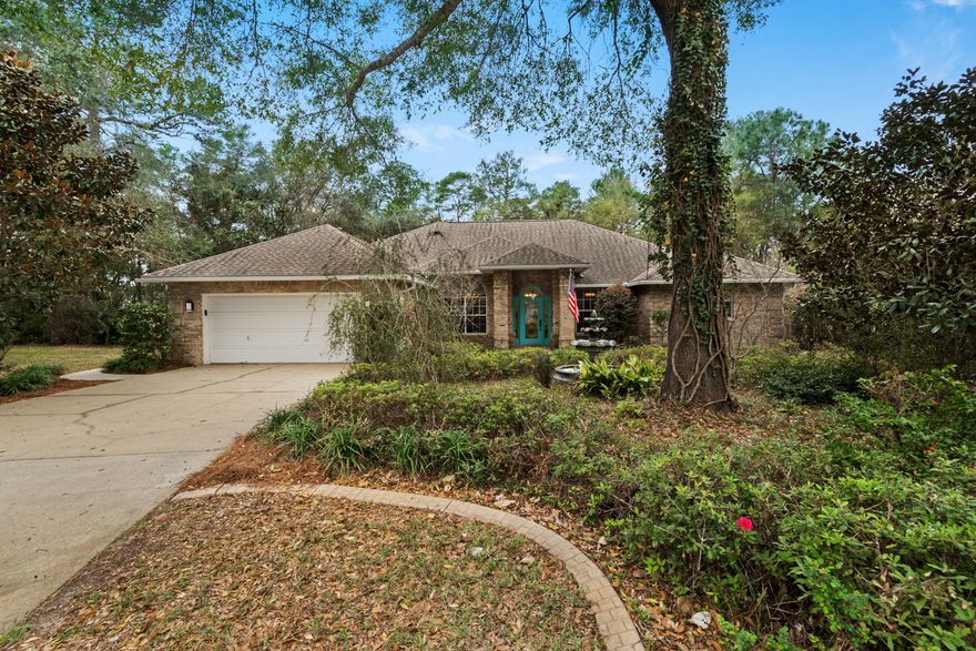 Come explore the wonder that surrounds this Rocky Bayou charmer in the heart of Niceville. From the park like setting on a half acre, large enclosed pool and spa, to the beautiful updates. This perfect entertaining home awaits. The large 24 X 24 workshop/garage in the back of the home is the most amazing hidden gem with tons of lighting for whatever project your heart desires. This well appointed home has a split floor plan with the 4th bedroom being used as a study.  The beautiful kitchen is in the center of the home with gorgeous quartz counter tops, stainless steel farmhouse sink, dual fuel stove and extra bar space with a wine fridge. The large master suite boasts a remodeled bathroom with heated floors, large soaker tub, shower, and double vanity with under cabinet lighting.