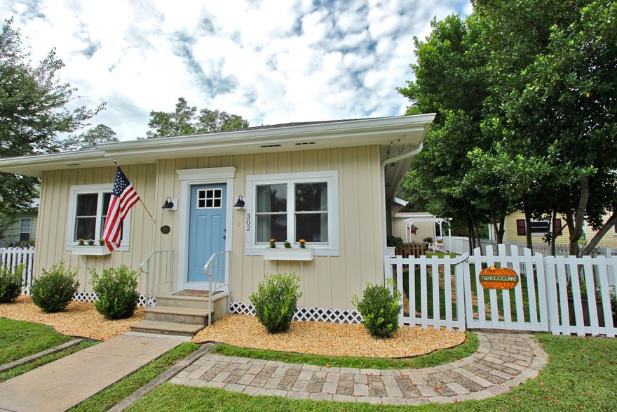 Completely renovated to the most discriminating standards - I can't possibly describe how perfect and charming this FL cottage is, just 1 block from Lake Defuniak! With large, comfortable rooms and a great layout, you can't ignore the details and love that went into creating a beautiful space. Gorgeous wide plank pine flooring and a perfectly appointed kitchen: white shaker cabinets, island with gas range & butcher block countertops - plus a roomy breakfast area. Master bedroom w/ barn doors plus marble mosaic tile, shiplap walls and a clawfoot tub adorn the charming master bath. Second bath has spacious tile shower. Mosey back through the mudroom/office to your screened porch, patio with pergola and lots of extra separate storage. Perfectly situated on a small lot for easy maintenance!