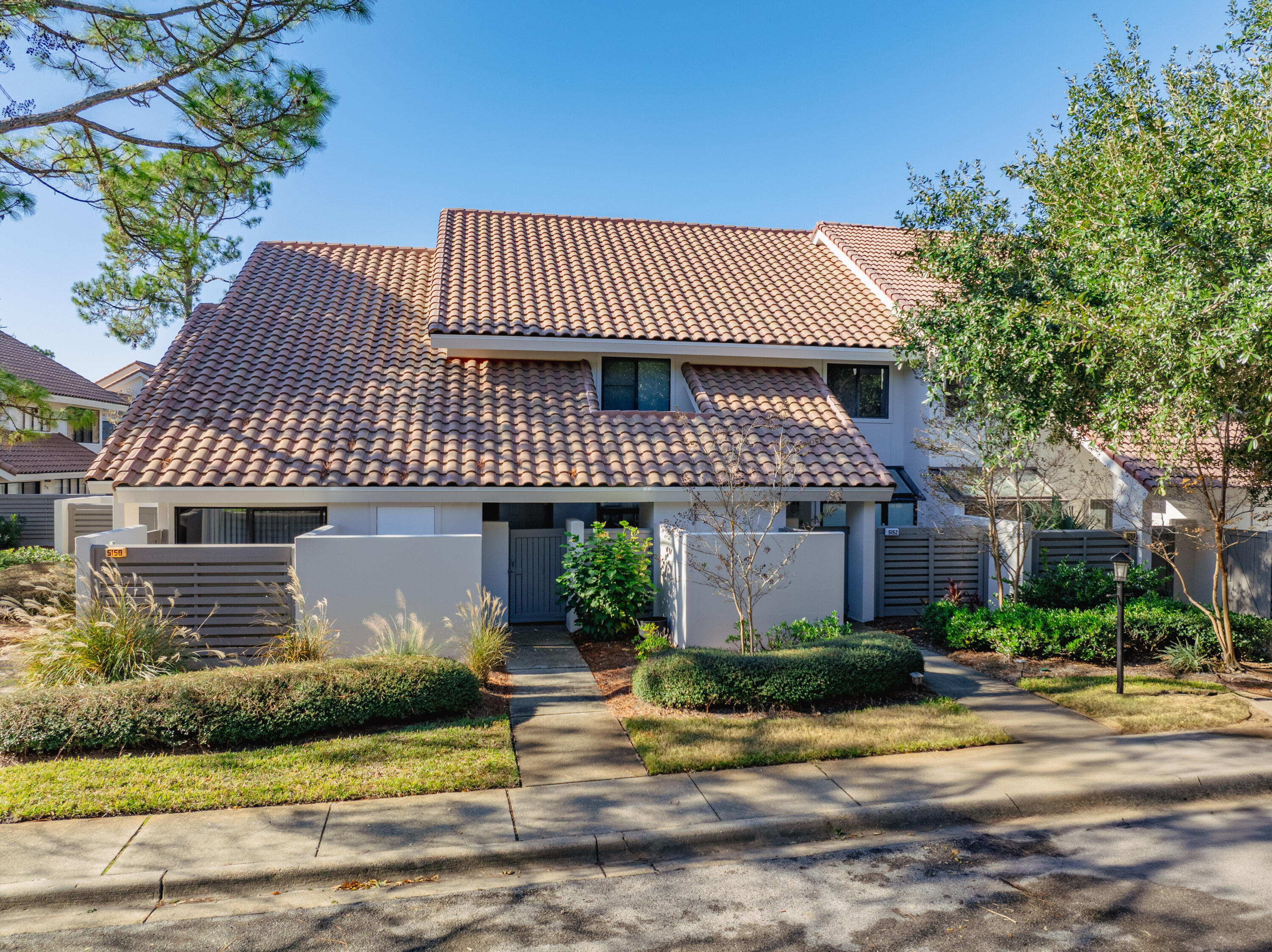 SELLER FINANCING AS LOW AS 4%! New roof completed August 2024. Located on the beachside of Sandestin, this charming Beachwalk townhome boasts an ideal position within half a mile of the sugar sand beaches of the Emerald Coast and offers picturesque views of Horseshoe Lake. A private, gated covered patio welcomes you and not only provides outdoor seating but also ample storage for beach gear. The first level features a well-equipped kitchen, with granite countertops, a ceramic backsplash, & stainless-steel appliances, along with a breakfast bar, an open dining and living area, and a convenient half bath. Ascend the stairs to the second level, where you'll find two bedrooms, each with an en-suite bath. The Primary Suite overlooks Horseshoe Lake with a King-sized bed for a comfortable beginning and end to your daY! Guests enjoy their own space in the second bedroom with two twin beds and a private bathroom. Don't forget to step out through the sliding glass doors in the living room to the open patio, offering captivating views of the lake. This rental-ready property is offered fully furnished, ensuring a seamless and comfortable experience for residents or vacationers alike. Owner will replace roof, installation timeline to be determined.
As an introduction to the Sandestin lifestyle, we invite our new owners to explore amenities that make Sandestin special. The listing brokerage and seller(s) are presenting the buyer(s) of this property with (2) 90-minute rounds of Tennis court time, a golf foursome at one of our three championship courses, and a round of golf for up to four (4) players at the unrivaled Burnt Pine Golf Club.
Sandestin Golf and Beach Resort features more than seven miles of beaches and pristine bay front, four championship golf courses, 15 world-class tennis courts, a 226-slip marina, a fitness center, spa and celebrity chef dining. Shop, dine and play at the charming pedestrian village, The Village of Baytowne Wharf and more. Inside the gates of the resort, residents enjoy a balanced lifestyle of high-class living, spanning the 2,400 acres from the beach to the bay. Everything within the gates of the resort is accessible by golf cart or bicycle. The entire resort is interconnected by miles of pedestrian, bike and golf cart paths that weave through groves of live oaks, meandering past natural lagoons, fountains, man-made lakes, and meticulously landscaped fairways.