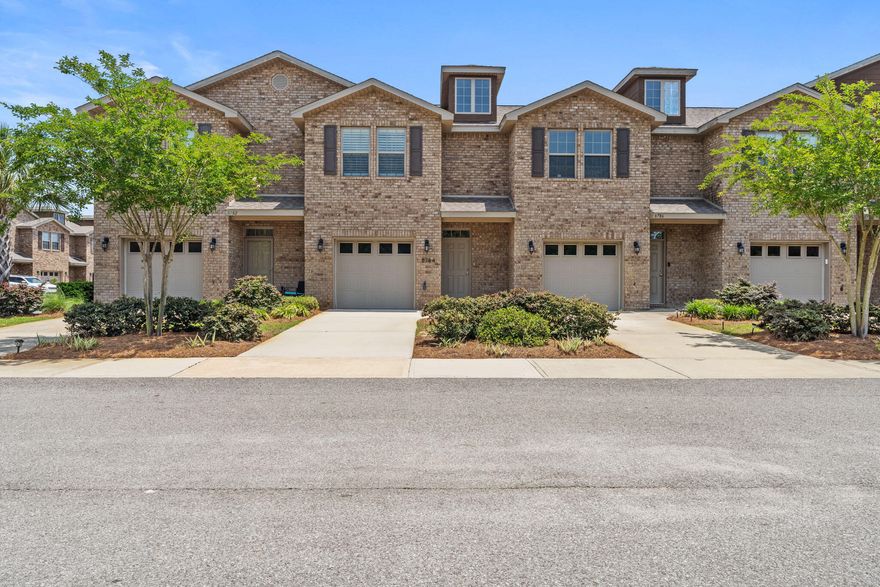 Come see this upscale townhome located in the back of the desirable Reserve Pointe for added privacy.  This  3 bedroom 2.5 bath has MANY new upgrades such as an A/C air filter system,  a vinyl privacy fence surrounded by beautiful flowers with fresh sod, pull out stainless steel drawers in kitchen, and bathrooms, stainless steel refrigerator with warranty, beautiful luxury vinyl flooring and carpet throughout, all walls have been freshly painted, plantation shutters, front storm door, barn door in the master bedroom, mud room and storage under stairs and wainscoting through out the home.  Check out the list of upgrades under the documents section.  The family friendly amenities include a pool, picnic tables and a play area.  Reserve Pointe is minutes from the best beaches in the world.