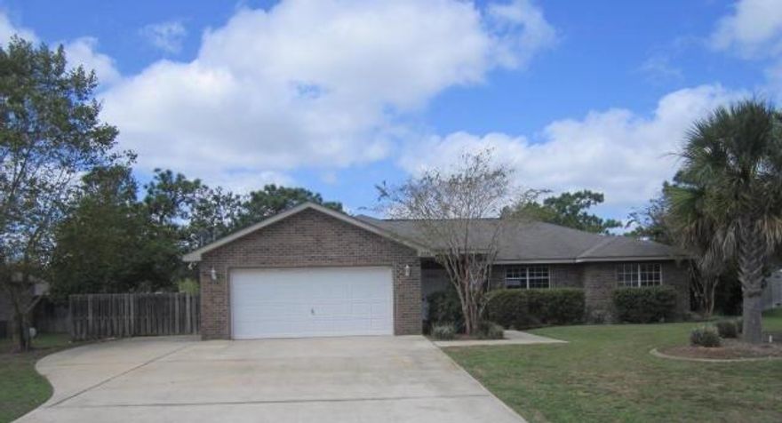 Immaculate 3Bdrm/2Bth Gooden Home. This home is ready for a new owner! Move Right In! NEW Neutral CARPET * FRESH NEUTRAL PAINT * NEW KITCHEN APPLIANCES * Some new fixtures. This contemporary style home is VERY spacious and open. Popular Split Floor Plan with Plant Ledges, Fireplace and Sliding Glass Doors to the Privacy Fenced Backyard * Enjoy the amenities of Holley by the Sea with community pools, tennis courts, gym, access to Santa Rosa Sound & East Bay and more. This is a MUST SEE !! Buyer to verify all details and dimensions and satisfy self