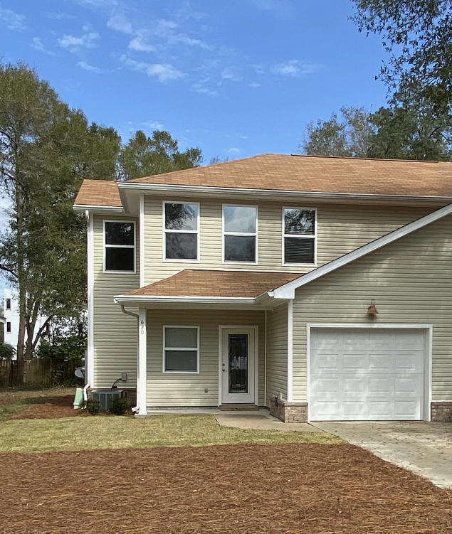 IMMACULATE townhouse in the heart of Niceville. Just minutes to all of the bases, shopping, & beautiful beaches. NO HOA fees! 2005 home is well built & has a low maintenance vinyl/brick exterior. Extended 1-car garage has 9' doors accommodates a larger vehicle. FRESH PAINT AND NEW CARPET throughout! 2-story foyer makes a very impressive & light-filled entry. 1ST floor includes a spacious master bedroom w/ en-suite bath, jetted tub & large walk-in closet. Kitchen is well equipped w/shaker style cabinetry & plenty of room on the breakfast bar for added guests to watch you cook. Great room has beautiful tile flooring & a great view of the back yard! Laundry & half bath are also conveniently on 1st floor. 2ND floor has 2 more bedrooms w/large closets another full bath. Sprinkler system.