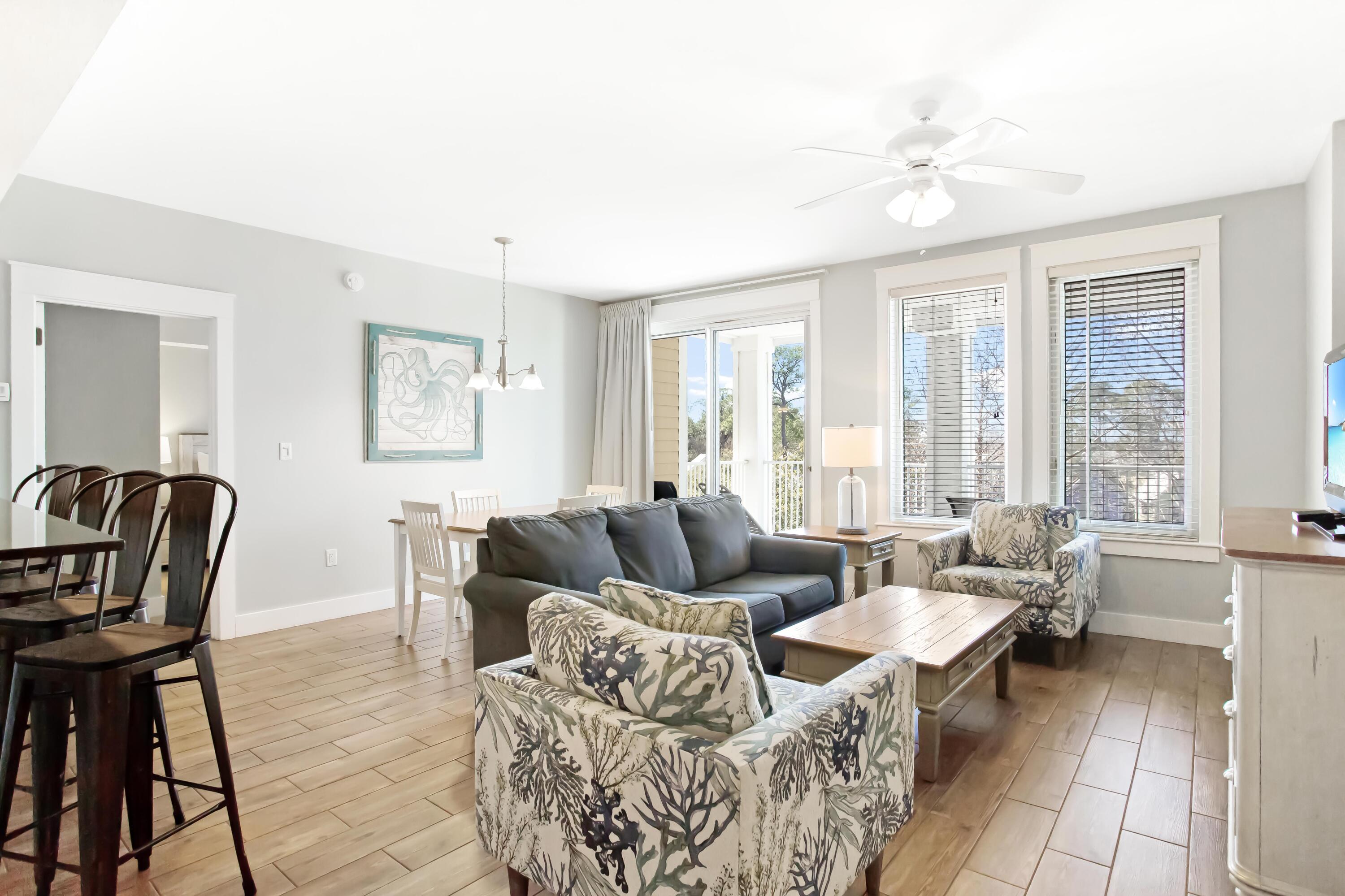 Prime location in the heart of Sandestin, this 3 bedroom lock-off on the 3rd floor of Observation Point South is the ideal place to live the resort life. This immaculate condo boasts the perfect floorplan for both personal use and for optimization of rental capabilities. Use as either a 3 bedroom or separately as a 2 bedroom + studio. The open living/kitchen/dining space is sun-filled and perfect for entertaining. Fully furnished with an island chic interior, LVP floors span the main living areas and studio side. Unwind after a day on the beach on the spacious balcony and watch all the happenings of The Village of Baytowne Wharf. Owners and their guests have access to the amenity terrace which boasts a resort style pool, hot tub, fitness center, and a beautiful lawn with a grilling area.