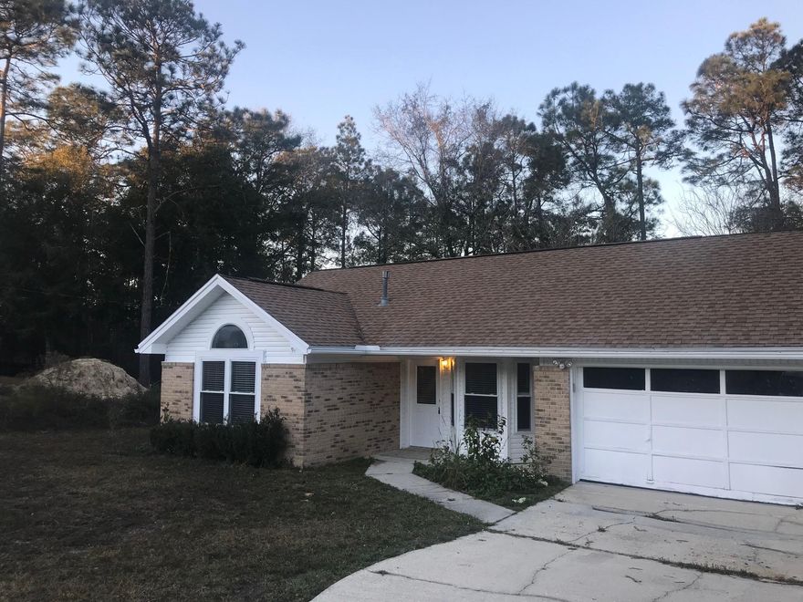 Great 3 bedroom 2 bath home for sale at the end of a cul de sac! This adorable property features fresh paint, new carpet, stainless steel appliances, a breakfast bar, fireplace, and more! Large fenced in yard with deck. The property will be receiving a new garage door (on order). Vacant and easy to show!