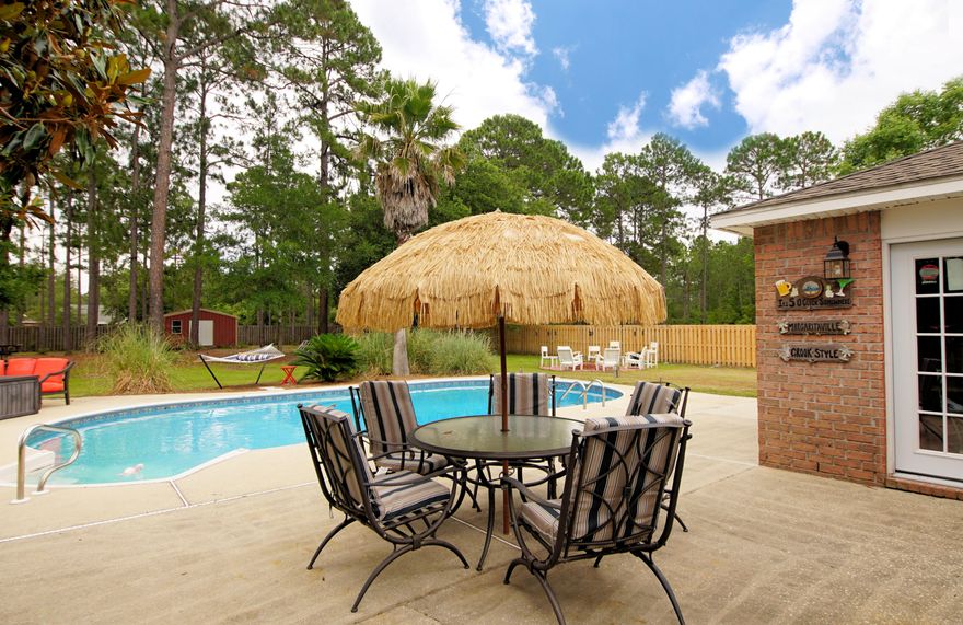 Welcome Home! Happy summers for the whole household with your in-ground pool large enough for any gathering. The cleverly designed open floor plan makes the most of the space, natural light and view of your back-yard paradise.This home features 4 bedrooms and 2 full baths making it spacious and accommodating for any life style. It has plenty of room for everyone to come together.It has an eat in kitchen for those quick morning breakfasts and a separate formal dining room. You will actually enjoy whipping up gourmet meals in this bright, cheery and efficient kitchen. It features plenty of cabinets and counter tops highlighted with a food preparation island. Kitchen has electric stove, dishwasher and microwave and a breakfast nook that overlooks your pool and backyard,