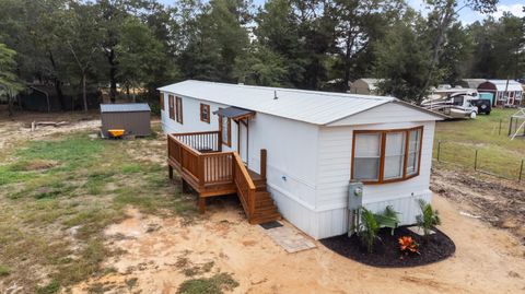 Photo of 66 E Orange Blossom Avenue, DeFuniak Springs, FL 32433 (MLS # 988558) Photo of 66 E Orange Blossom Avenue, DeFuniak Springs, FL 32433 (MLS # 988558)