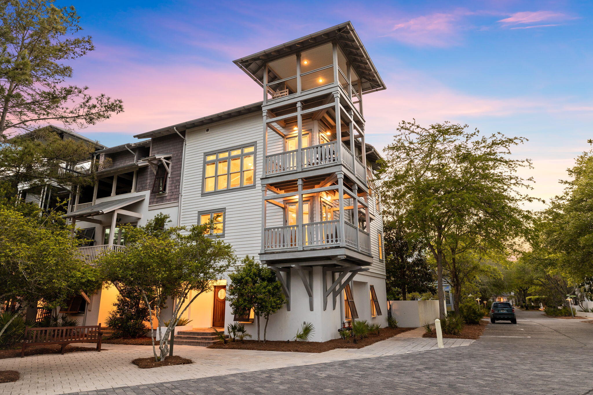 Seller offering $50,000 SELLER CONCESSION towards upgrades and improvements! ** Overlooking the St. Augustine Green in Rosemary Beach, this four-story attached home is a must-see! Enjoy panoramic views of the lush greenery and Rosemary Beach from every level, featuring balconies on the second, third, and fourth floors. Stepping inside to the first floor you will find two inviting guest suites, each designed for comfort with king beds and ample closet space. Conveniently located on the first floor is a wet bar complete with an ice-maker.Outside, off the first floor, awaits an expansive deck, perfect for family gatherings and outdoor entertaining. The allure continues with APPROVAL from the town architect for a PRIVATE POOL or CARRIAGE HOUSE to enhance the outdoor experience if desired.

Ascend to the second floor via the elevator to find another guest suite and the primary suite, both boasting king beds, private ensuites, and walk-in closets. The master suite has its own private balcony, double vanities, a soaking tub, and breathtaking treetop views.

The heart of the home resides on the third floor, where an open-concept layout seamlessly connects the kitchen, living, and dining areas. Step outside to the balcony, perfect for dining or lounging while enjoying the serene views of the St. Augustine Green. 

Venture to the fourth floor and be greeted by another inviting living space, complete with a flat-screen TV, sleeper sofa, and an additional bunk bedroom ideal for accommodating extra guests. 

The rooftop balcony is a hidden gem, serving as the perfect spot to capture sunset views and admire Rosemary Beach from a new perspective. As one of the rare homes in Rosemary Beach with a tower designation, it provides an unparalleled experience.

Enjoy the exclusive amenities of Rosemary Beach, including four community pools, an owner's-only club just steps away from 5 Johnstown Lane, tennis courts, expansive green spaces, a gym, fitness trails, and much more. Come discover a world of luxury, comfort, and relaxation in this Rosemary Beach retreat. 
** All information and dimensions to be verified by Buyer.**