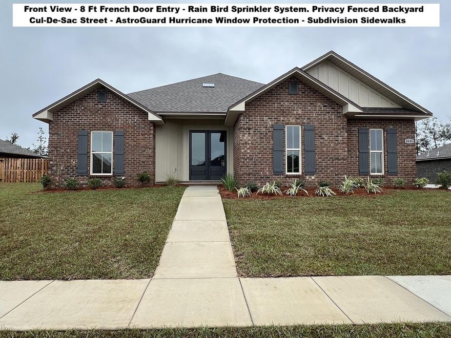 New Construction and Move In Ready! South of I-10 Located in the Gated Community of Chanan Estates.  PRIVACY FENCED BACKYARD! Family Friendly Cul-De-Sac Street with Very Little Traffic with only a Few Lots Remaining. FLOOR PLAN and photos are attached. BUILDER PAYS MOST CLOSING COST, ASK FOR DETAILS. Perfect for MULTIGENERATIONAL Living or HOME OFFICE Plus A HUGE UPSTAIRS BONUS Room.  Over 2500 Square Foot of Vintage Gray Porcelain Tile on the First Floor. Stately 8 Foot French Door Entry.  5 Bedrooms & 3 Full Baths Downstairs. Oil Rubbed Bronze Finishes, QUARTZ Counter-Tops, UNDER & OVER CABINET LIGHTING, Single Bowl Sink, WALK-IN PANTRY with CUSTOM WOOD Shelving. MASTER SUITE - Tray Ceiling with Stacked Crown Molding & Rope Lighting, CUSTOM WALK-IN TILED SHOWER with 2 Recessed NICHES, Freestanding SOAKING TUB, with TILE SURROUND, 2 Separate Quartz Top Vanities, Walk-in Closet with Custom Built Wood Shelving combined with Vented Shelving, Private Water Closet, French Door Rear access to the Back Porch. SPRAY FOAM ATTIC INSULATION. The Upstairs and Stairway is Carpeted for added Noise Control with Zero Carpet Downstairs. 2 Car Side Entry Garage with High Ceilings with Plenty of Driveway Space for Additional Parking. ALL BEDROOMS Have Walk-in Closets and Ceiling Fans. No City of Crestview Property Taxes. Looking for a Future Swimming Pool, No Problem as this Section of Chanan Estates is on Sewer. Mechanical and Other Information: AstroGuard Hurricane Fabric for Windows & Doors is Included with this Home. The Yard has a Rain Bird Automatic Sprinkler System Installed and is Fully Sodded with Front Landscaping. The Heating and Cooling System is a Carrier Heat Pump and the Utilities are all Underground. Stainless Appliances Include, ISLAND RANGE HOOD, Slide-In Range, Microwave, Dishwasher. In addition to this home being in a gated neighborhood there are sidewalks and yard lighting throughout. Be the 1st to live in this BRAND-NEW Brick Home. The Floor Plan is unique and offers so many options, check the Floor Plan for details in the Photos. Built to the new 2025 building code offering low initial maintenance with piece of mind that everything is new. Buyer to verify measurements, school zones, and other items of importance to the buyer. ONLY 5 MORE HOMES will be built in CHANAN ESTATES, and the Subdivision will be BUILT OUT.