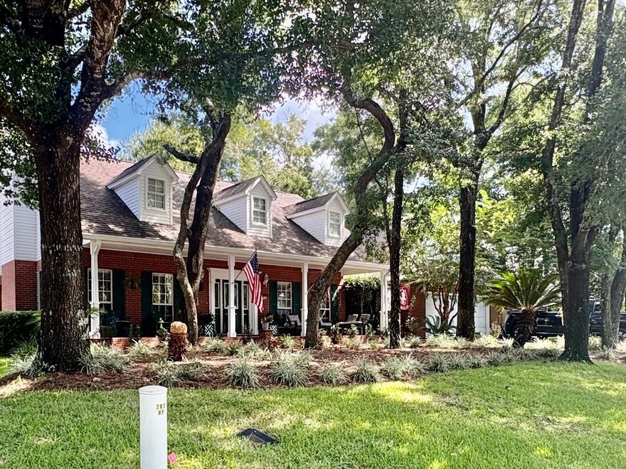 This 4-bedroom, 2.5-bath home offering approximately 3,118 sq. ft. of thoughtfully designed living space. Perfectly situated near top-rated schools, white-sand beaches, shopping, and military bases, this home blends classic charm with modern amenities. Step inside to find high ceilings, a welcoming wood-burning fireplace, and an open kitchen with stainless steel appliances--ideal for both daily living and entertaining. The spacious dining and living rooms provide a natural flow for gatherings, while the large laundry room and extra-large two-car garage add everyday convenience. The second story ideal for a private retreat featuring a game room, office, small bar area, alcove, half bath, hallway, and multiple storage spaces, all serviced by its own AC!Out back is your own private retreat featuring an inclosed screened patio, pathways to the salt water pool, hot tub, garden and seating areas! 
*Buyer is responsible for verifying all information deemed important to them. 