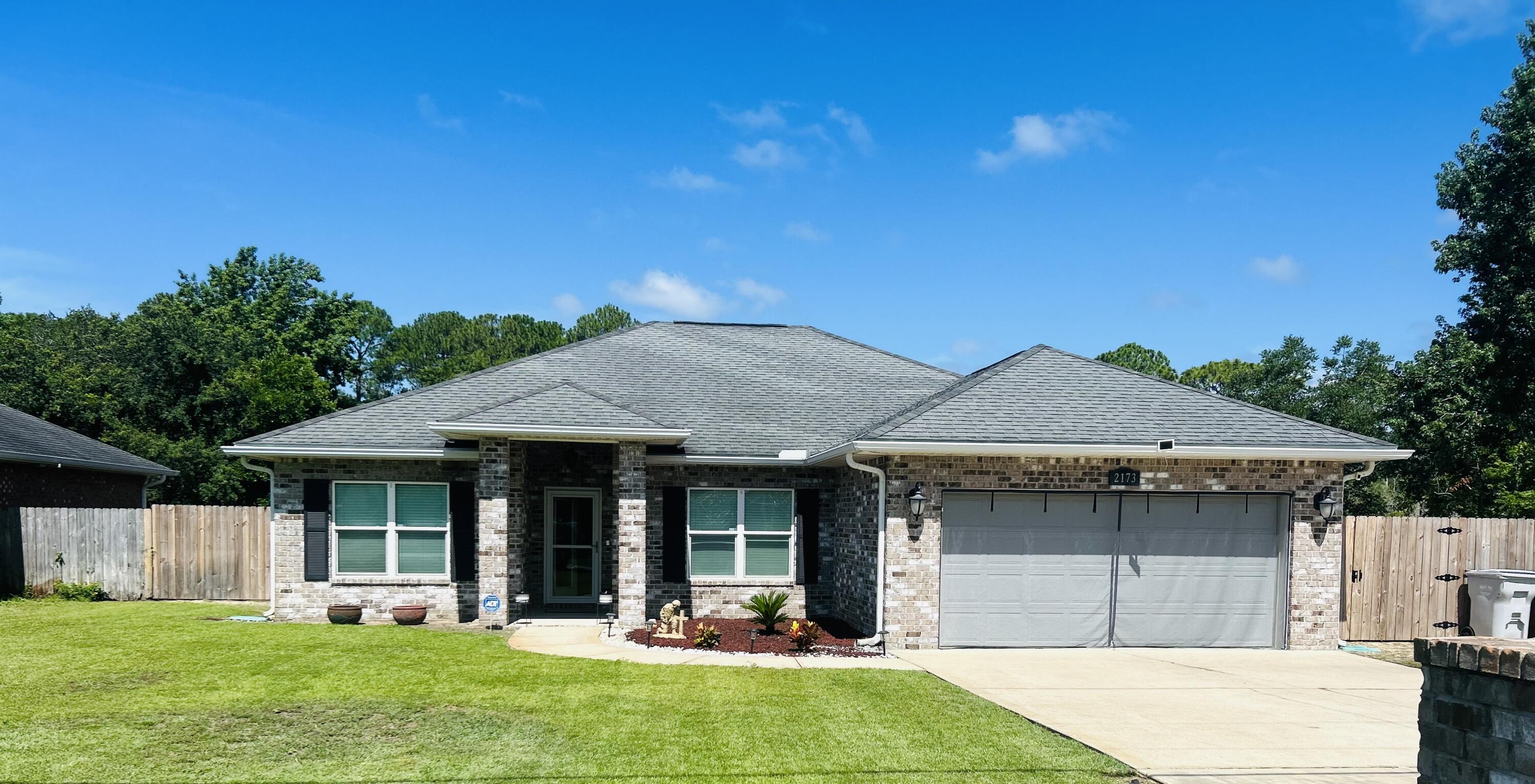 Beautiful all brick , split floor plan is ready and waiting for you. With 9-10 foot ceilings, spanish lace textured ceilings, crown molding, ceramic tile in living room and hard wood floors in the bedrooms. Plenty of cabinets in the kitchen with a large pantry that has double doors to hold it all. Large storage shed in the back yard that is fully fenced and a screened in porch in the back yard. Then to top it off a hot tub to relax in at the end of the day. Small pets allowed with owner approval. Call today for your personal tour - then you will say - where is the paperwork - I'm ready to make this my home.