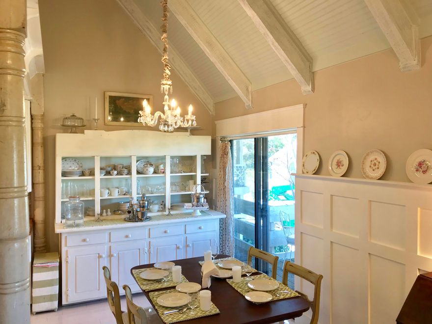 Beautifully remodeled in Vintage decor this 2nd floor unit on the 10th fairway of Seascapes 18 hole Championship golf course is one you won't want to miss. Whether you are looking for that full-time or vacation home this unit has upgrades that will be hard to pass up. Upon entering, you'll immediately notice the raised tin and bead board ceilings along with the beautiful bamboo floors. Just to the left you'll enter into the open kitchen lined with Martha Stewart cabinets and pantry, huge farmhouse style kitchen sink. You are going to love the counter top extension. Throughout you'll find 5 panel doors and vintage glass knobs. Did I mention the chandeliers? With an unobstructed view, you can watch the golfers from the kitchen, dining and living room.