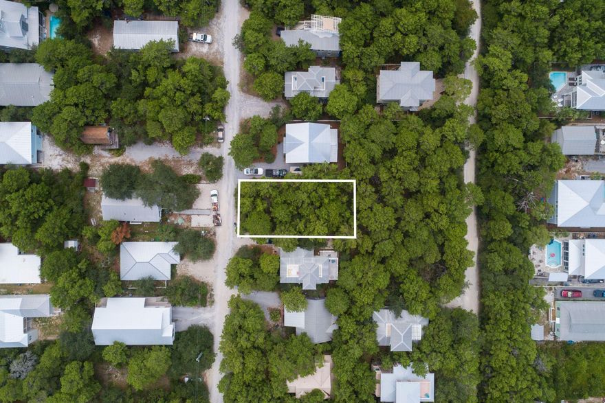 When you build south of Scenic 30-A to have the best of both worlds for walking south to the GULF and the Eastern Lake Inlet beach walk over. Also within walking distance to the Restaurants and shopping nearby from this Lot. This is old Seagrove Beach, west of the Eastern Lake, South of Scenic 30-A and a favorite place to reside or use as an Income Producing rental house. One would be well served to drive down this shell path road to see the days gone by when neighbors are walking their dogs in the afternoon, children riding bicycles to go swimming and fishing in the Gulf. The Community Swimming pool is just a few steps south on Camelot across the Eastern Lake Road. Enjoy this wonderful location. No build out time required.