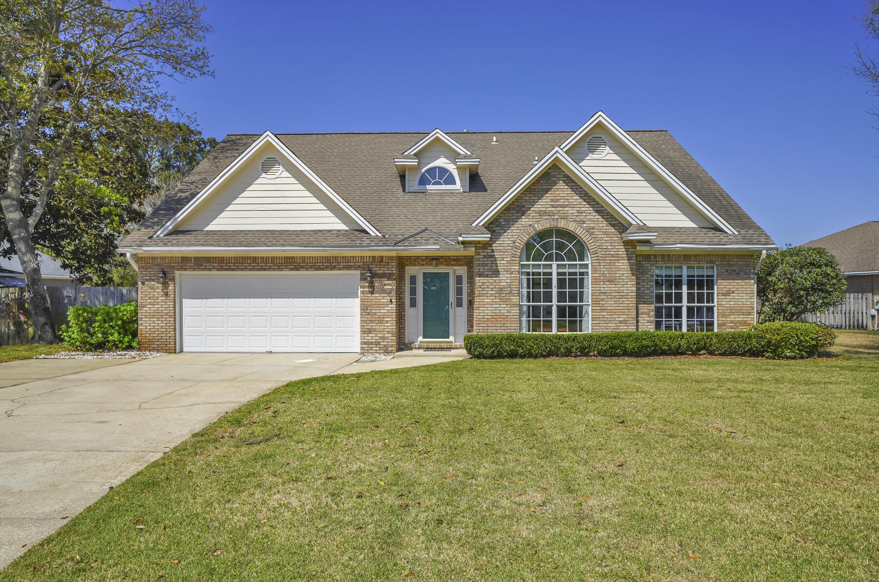 NEW ROOF! If you are looking for a dream home with stunning views, located within a very short distance to Eglin AFB look no further. This two story 4 bedroom, 3.5 bath, POOL home has SO much to offer: hardwood flooring throughout, as well as tile floors, cathedral ceilings, large dining area, breakfast nook and separate office, stainless steel appliances in the kitchen as well as a large island and chef's gas dual convection/convention range, granite countertops, and a walk in pantry. The downstairs master has 2 walk-in closets. Home also has a high-efficiency A/C and furnace installed in 2017, newer hot water heater, pool pump and salt generator, covered pool, boat/jet ski storage access/space in the back yard, as well as access to community dock perfect for paddle boarding and kayaking