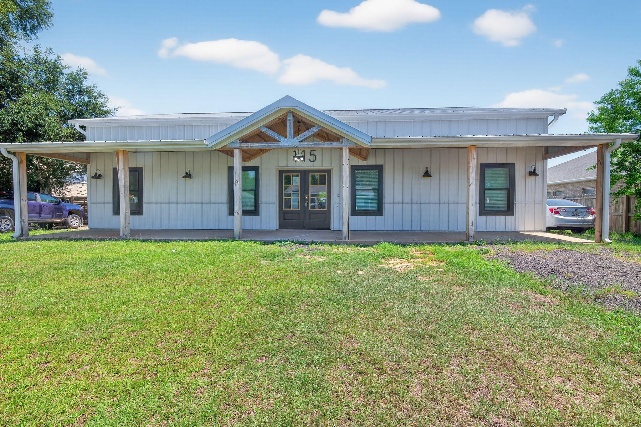 Built in 2023, this modern farmhouse offers a rare blend of style, space, and function just minutes from Hurlburt Field, local schools, shopping, and the white-sand beaches of the Emerald Coast. Designed with a ranch-style layout on the main level and a spacious loft upstairs, this 2-story home features 5 bedrooms, 3.5 bathrooms, and soaring 11-foot ceilings throughout the main floor.Enjoy bamboo flooring throughout, a bright open living area, and a well-equipped kitchen with new stainless steel appliances. The nearly half-acre lot is fully fenced and includes in-ground pool, two detached outbuildings with electric--ideal for workshops, storage, or hobby space. With durable metal roofing and siding, this home is built for long-lasting performance.