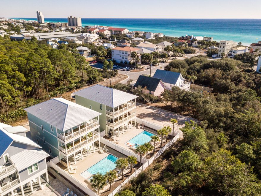 Amazing Rental Property! Just one mile east of Seaside and a short walk to the beach!! Beautifully decorated and rental ready! This 8BR/8.5BA luxury home is complete with a large heated pool and hot tub, outdoor kitchen, a media/game room, plenty of entertaining space and spacious balconies. The floor plan showcases multiple master bedroom suites including a master on the main and the built-in bunk rooms with twin and queen size bunks. Fine details such as granite countertops throughout the kitchen and bathrooms. An ideal retreat for family gatherings, wedding parties and the ultimate beach getaway!