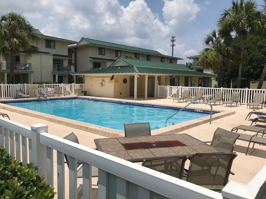 HOA FEE ONLY $ 173 MONTHLY!!One Block to Beach! Extremely Charming First floor unit. Remodel Just completed. New paint, All Hardware, Interior doors. All New Kitchen with white cabinetry, stainless appliances, beautiful Granit. HOA FEE ONLY $ 173 MONTHLY!!Bathroom: upgraded fixtures, granite vanity.Standard size Washer/ DryerCommon area is well maintained, offering grills and gorgeous Pool!