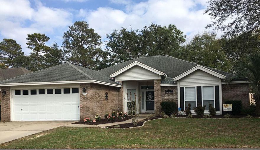 Location! Location! Location! In the gated community of Parkwood Estates, this updated 4 bedrooms, 2 bath home is the perfect family home. The fully fenced back yard opens through a private gate back to the neighborhood community space - fun for kids of all ages! This home features updated flooring, paint, kitchen counter tops, sink, appliances, fixtures, and so much more! A gorgeous sun room opens through 2 sets of sliding doors, a gas fireplace warms the corner of the family room, and Bluewater Elementary school is just across the street!