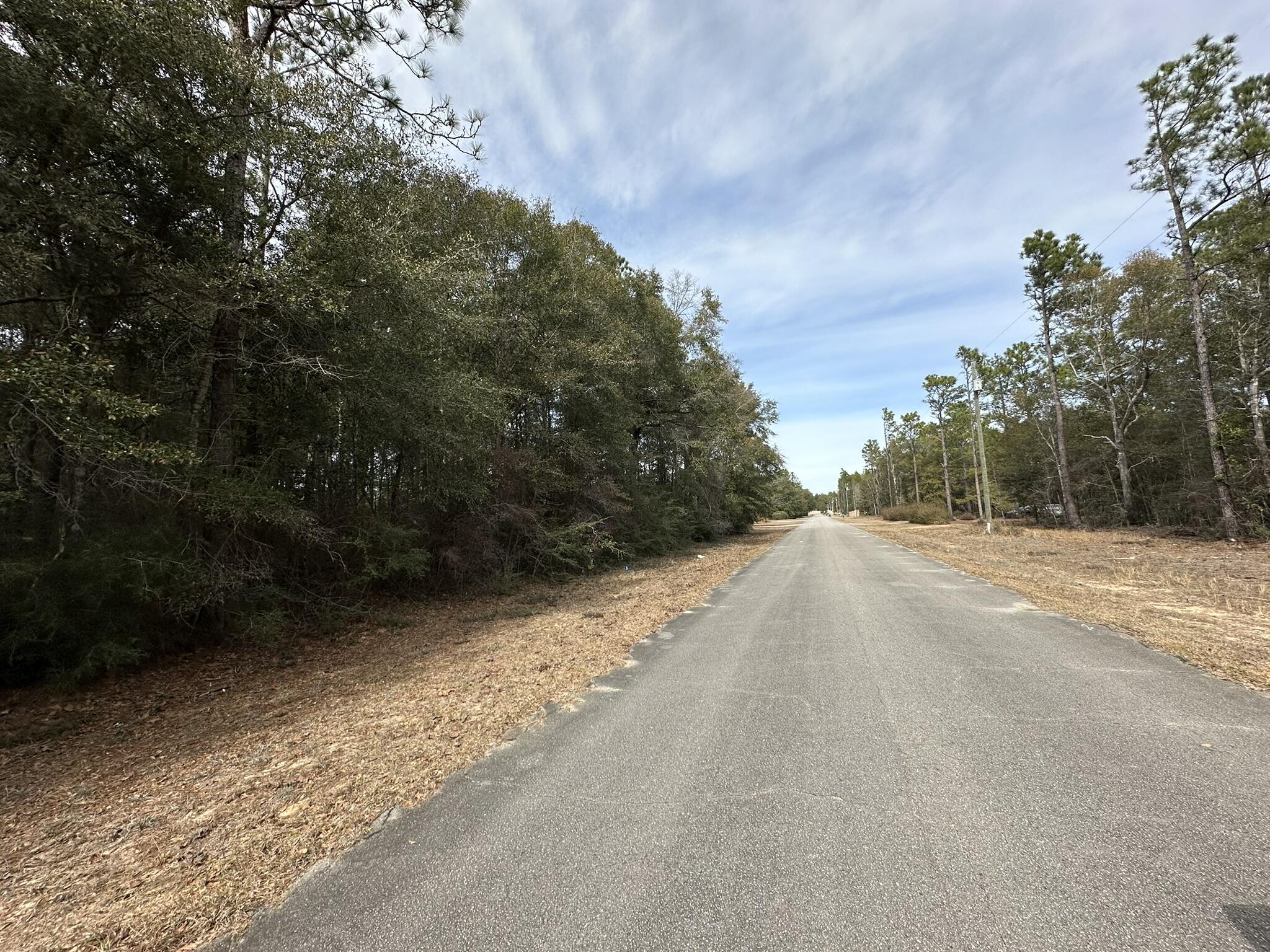 Four parcels totaling approximately 3.4 acres located in the Auburn and Garden City area of Crestview. Zoned residential, these lots provide an opportunity for new construction in a location with access to major roadways, including Hwy 85, Hwy 90, and I-10. Positioned within the North Crestview area, the site offers proximity to local infrastructure, including commercial services and public facilities.