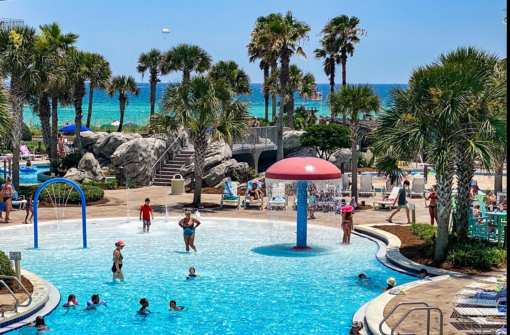 RARE GEM!  BEST VALUE Priced unit at Waterscape! Beautiful interior in this 1br/2ba w/hall bunks. Sleeps 6! Waterscape's finest family beach resort w/so much to offer! Perfect location overlooking pools & KiddiePark! Clean & comfy 864sf plan. LPV flooring in DR,LR, MBR, tile in wet areas. Leather sofaset and floor to ceiling glass doors to private large balcony- separate bunk alcove w/true 2nd bath. Master BR w/ensuite bath. Top investment property w/lower holding costs. Much to enjoy-490' of beach, lazy river, zero edge pool, 10' waterfall, 2 hot tubs, Fuds food kiosk, heated upper pool, fitness ctr, kiddie play park, underground parking, sep owner storage room, 24hr security, gated entry and more. Like-type units gross 55-65K on rental. Your dream beach condo awaits Waterscape A324!