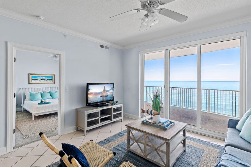 Home is Under Contract with a 24-hour Kick out clause. Soak in Sweeping Gulf Views from This 11th-Floor Coastal Retreat Gulf Front at Emerald Isle . Step into serenity with this beautifully refreshed 2-bedroom, 2-bath beachfront condo perched on the 11th floor of the highly sought-after Emerald Isle. Freshly painted and professionally staged, this beach retreat offers the perfect blend of comfort, style, and investment potential. Furniture available for purchase. Wake up to panoramic Gulf views from the master bedroom, which features sliding glass doors that open to an expansive 10x28 balcony. One of the largest you'll find in Panama City Beach. Enjoy uninterrupted views of the emerald waters!